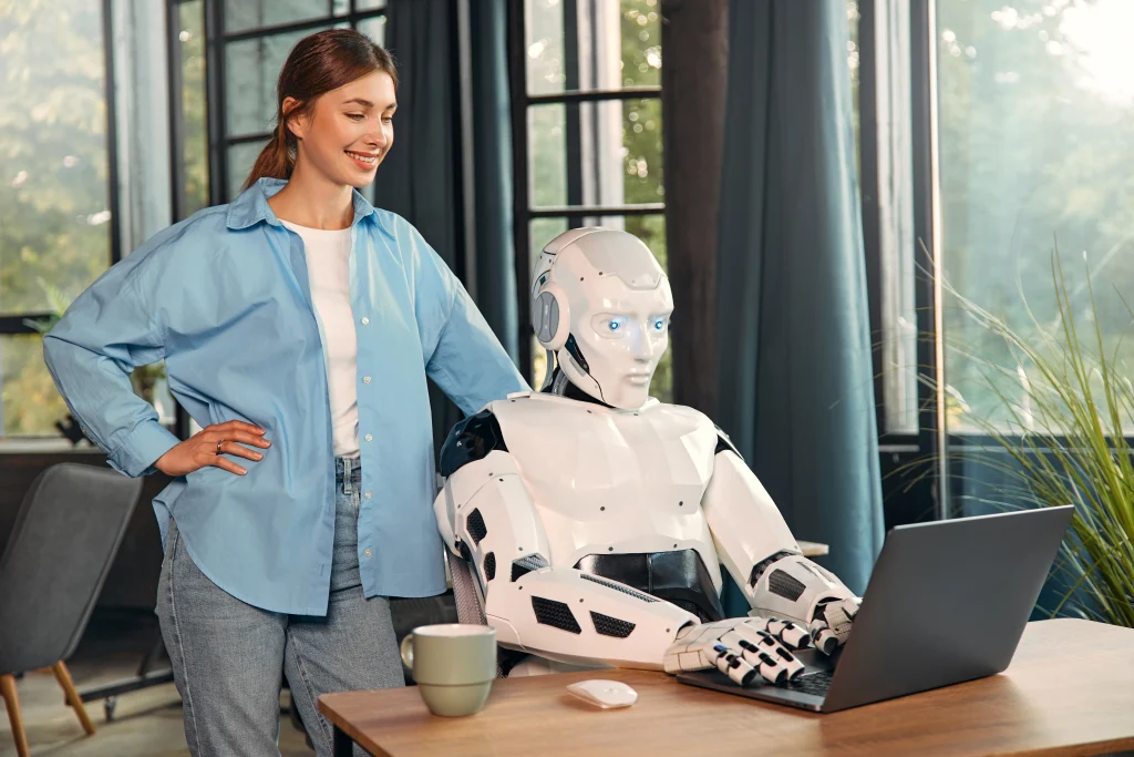 A humanoid robot holding a tablet, engaging in conversation with two business professionals in an outdoor setting. The image illustrates the role of AI in recruitment by showcasing a futuristic approach to hiring and decision-making.