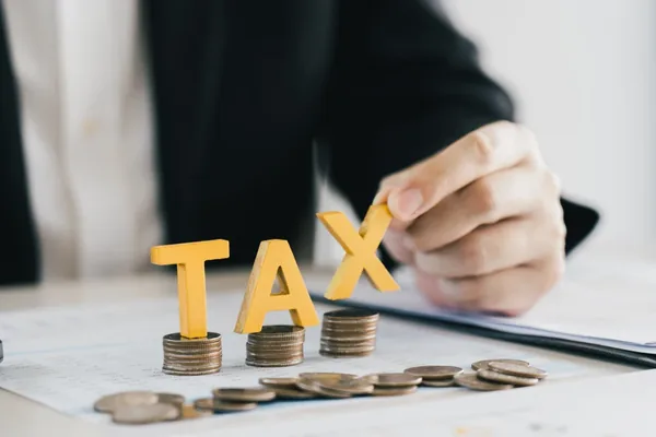 Business in Turkey - tax planning with coins and paperwork.