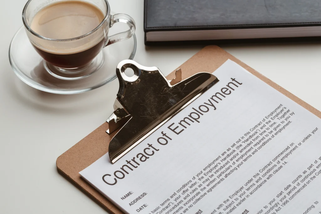 Close-up of legally compliant employment contract aligned with Turkish employment law standards