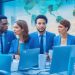 A diverse group of professional tech recruiters and IT specialists collaborating in a modern, sleek office space with digital maps and data displays subtly visible in the background, emphasizing Latin America as a vibrant hub for innovative tech talent and staffing.